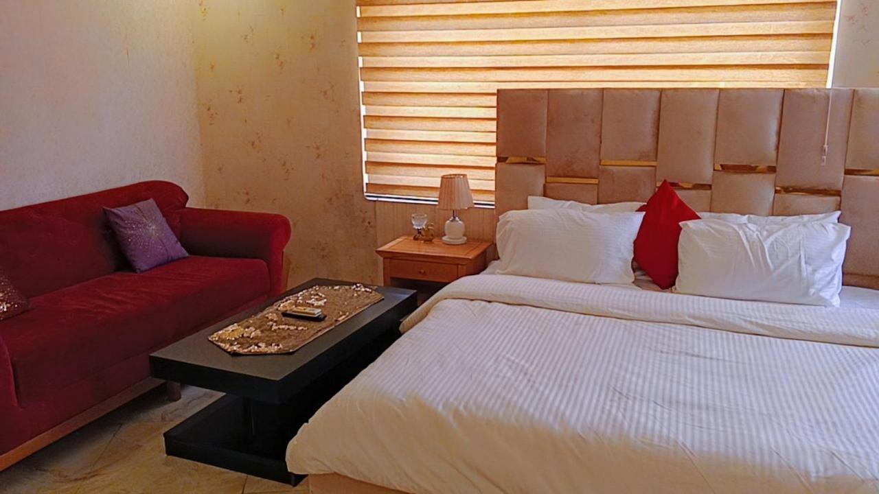 Nuit De Paris Hotel Абуджа Екстериор снимка